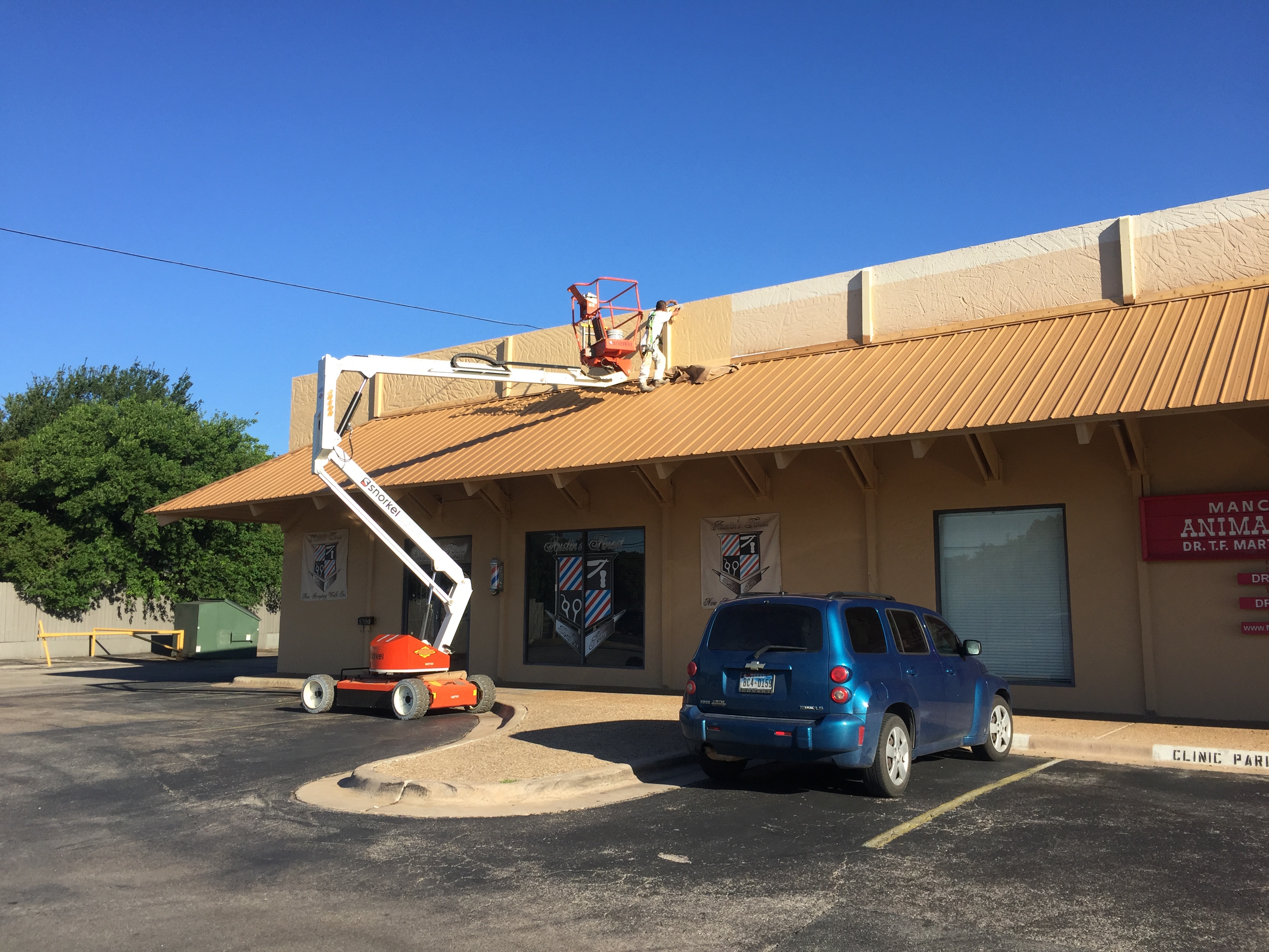 Retail building being painted