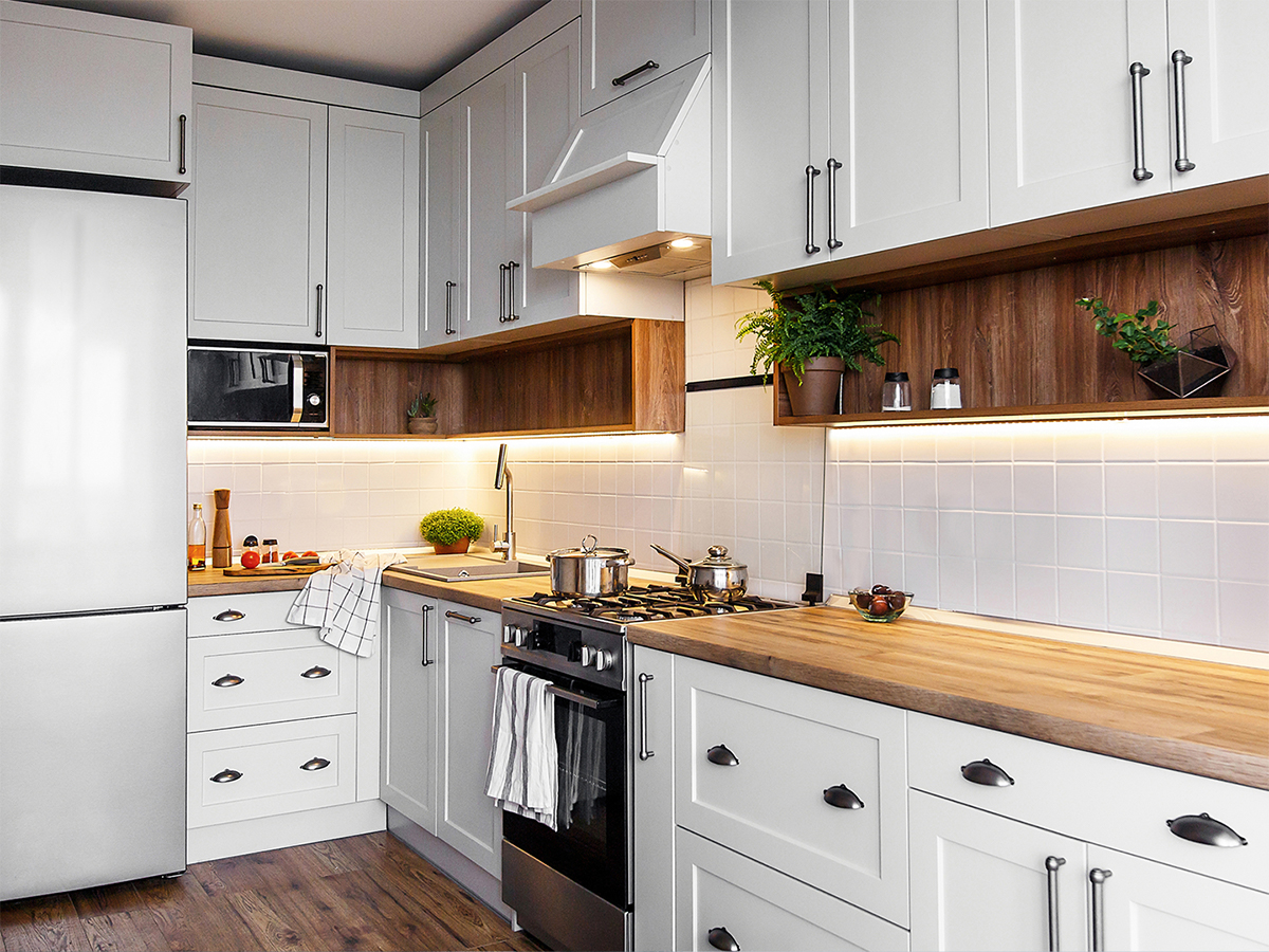 stylish kitchen with white cabinets